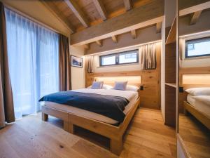 Un pat sau paturi într-o cameră la Porta Cervino