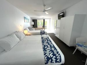Postel nebo postele na pokoji v ubytování Browns Broadbeach