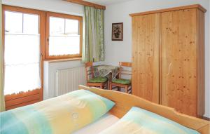 Łóżko lub łóżka w pokoju w obiekcie Ferienwohnung In Aschau