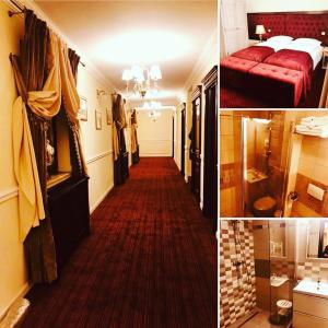 a hallway of a hotel room with a bed and a red carpet at Matrix Hotel in Tecuci