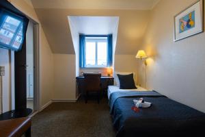Uma cama ou camas num quarto em Milling Hotel Gestus
