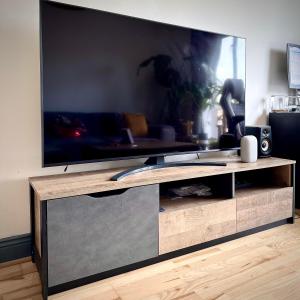 A television and/or entertainment centre at Riverview Apartment