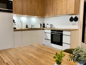 Kuchyň nebo kuchyňský kout v ubytování Ferienwohnung Dünensegler + 5 fotografií