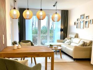 Posezení v ubytování Ferienwohnung Dünensegler