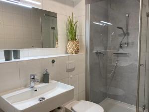 Koupelna v ubytování Ferienwohnung Dünensegler
