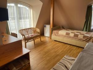 Postel nebo postele na pokoji v ubytování Ambrózia Guesthouse
