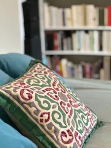 a pillow sitting on top of a couch at Villa Ermetica in Breil-sur-Roya