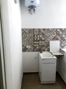 Virtuve vai virtuves zona naktsmītnē Trapani Apartments