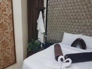 Voodi või voodid majutusasutuse Cairo Paradise Hotel toas