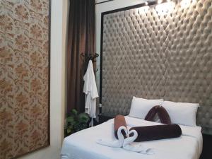 Voodi või voodid majutusasutuse Cairo Paradise Hotel toas