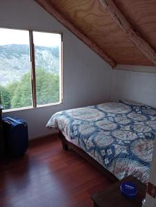 Krevet ili kreveti u jedinici u okviru objekta cabaña - refugio de montaña
