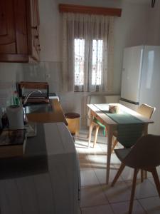 Kuchyň nebo kuchyňský kout v ubytování Snuggery Elegant Apartment