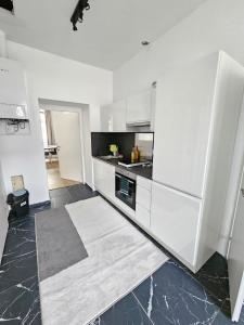 Kuchyň nebo kuchyňský kout v ubytování Cozy And Quit 1170 Vienna