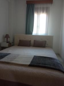 Postel nebo postele na pokoji v ubytování Snuggery Elegant Apartment