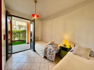 Photo de la galerie de l'établissement [400m dal Mare] Giardino - WiFi - A/C - Posto auto, à Loano