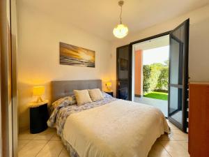 Photo de la galerie de l'établissement [400m dal Mare] Giardino - WiFi - A/C - Posto auto, à Loano