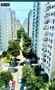 an aerial view of a city street with buildings at Joia Da Pitangueiras in Guarujá