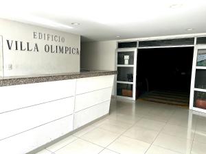 a lobby of a villa olivario olivarioovich sign in at Apartamento Cerca al Rio y Complejo Deportivo in Valledupar