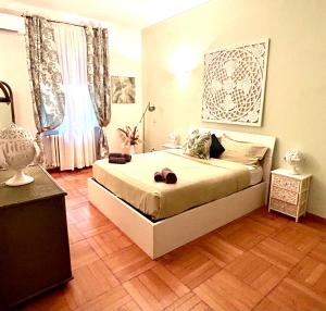 Posteľ alebo postele v izbe v ubytovaní MASOTTO APARTMENT LINATE-Close Center