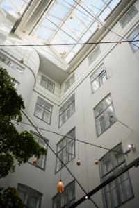 a building with windows and a glass ceiling at Hotel Skt. Annæ in Copenhagen