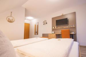 Postel nebo postele na pokoji v ubytování Hotel - Gasthof Blume