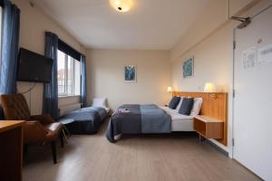 Uma cama ou camas num quarto em Milling Hotel Gestus