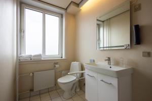 Uma casa de banho em Milling Hotel Gestus