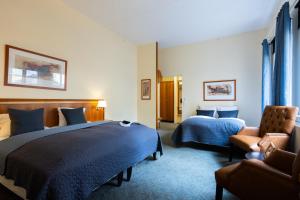 Uma cama ou camas num quarto em Milling Hotel Gestus