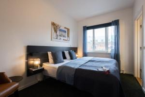Uma cama ou camas num quarto em Milling Hotel Gestus