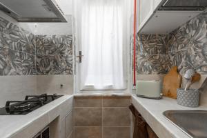 Kuchyňa alebo kuchynka v ubytovaní MASOTTO APARTMENT LINATE-Close Center