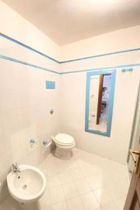 Kúpeľňa v ubytovaní Capo Coda Cavallo vista mare