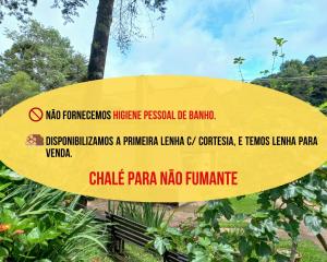 a sign for a park in the philippines at Chalé Recanto Boreal in Monte Verde