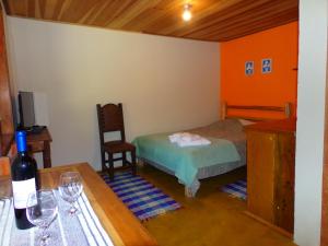 Ένα ή περισσότερα κρεβάτια σε δωμάτιο στο pousada no caminho do escorrega