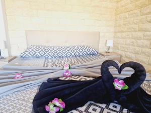 Postel nebo postele na pokoji v ubytování Small rooftop, Ocean view