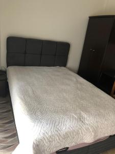 Postel nebo postele na pokoji v ubytování GIAZITZI