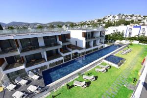 an aerial view of a building with a swimming pool at A'la Grand Residence in Bodrum City