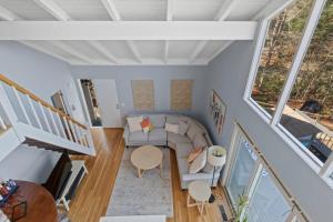 an overhead view of a living room with a couch at Stay On The Cape Vacation Rentals: Contemporary Saltbox In New Seabury in Mashpee