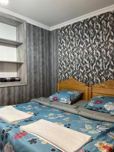 En eller flere senge i et værelse på Tsitsabo Family Hotel