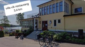 a building with bikes parked in front of it at Sjöviksvilla Sjöviksvägen in Växjö