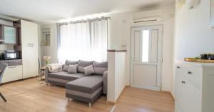 Kuchyň nebo kuchyňský kout v ubytování Apartment MIA