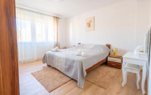 Postel nebo postele na pokoji v ubytování Apartment MIA