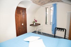 A bed or beds in a room at U Campanin