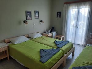 Postel nebo postele na pokoji v ubytování Jasmine