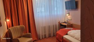 TV a/nebo společenská místnost v ubytování Hotel Restaurant Ruppert