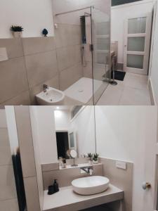 2 imágenes de un baño con lavabo y ducha en B&b Nicole, en Valguarnera Caropepe