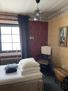 Postel nebo postele na pokoji v ubytování Villa Lyckan
