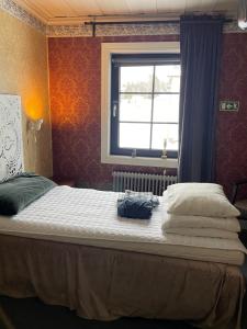 Postel nebo postele na pokoji v ubytování Villa Lyckan