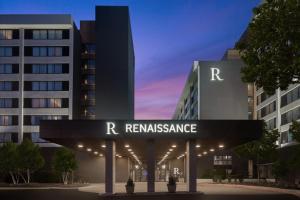 a building with a sign that reads r remassurance at Renaissance Chicago North Shore Hotel in Northbrook