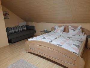 Postel nebo postele na pokoji v ubytování Haus Roßner