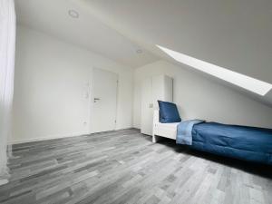 Postel nebo postele na pokoji v ubytování Apartment Weikersheim I